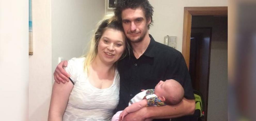 Jess Ford says she's heartbroken about the disappearance of fisherman Kieran Lynch, pictured here with their daughter Ava. Photo: Supplied