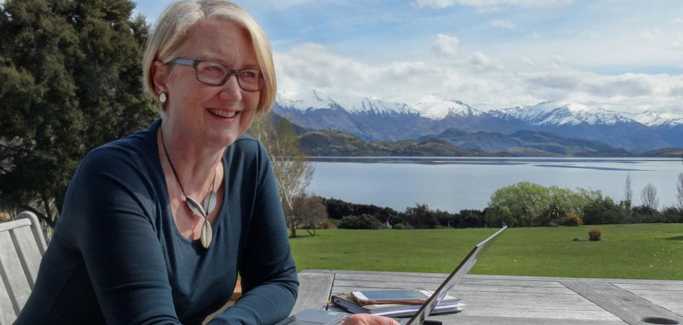 Dr Helen Anderson tries not to be distracted by the view when working from her family crib in...