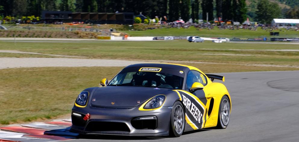 Grant Aitken (inset) races his 2016 Porsche GT4 at Highlands Motorsport Park in Cromwell at the...