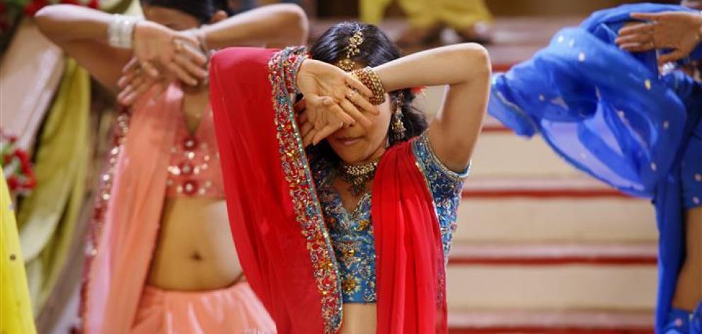 Bollywood film set with actresses dancing, India. Photo: Reuters Bollywood film set with actresses dancing, India. Photo: Reuters