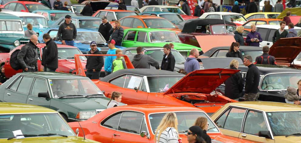 Hundreds of cars pack into the Crescent Rugby Football Club grounds on Saturday. Photo: Richard...