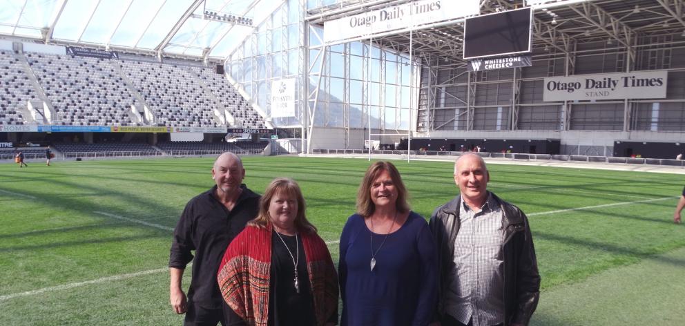 Looking forward to the Christmas in the Stadium event on December 2 are (from left) Acts of Kindness Charitable Trust members Grant and Anne Hardy, Dunedin Venues Ltd marketing manager Kim Barnes and trustee John Watson. PHOTO: BRENDA HARWOOD