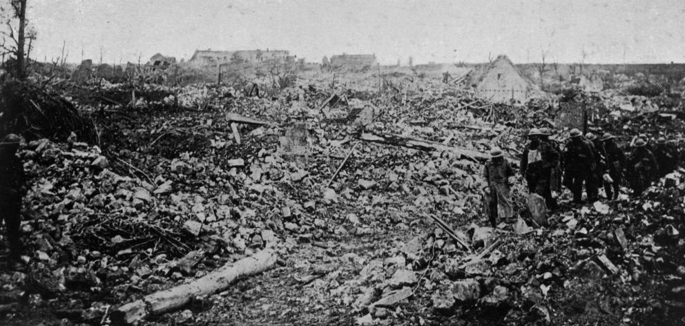 A section of the battlefield after a recent advance: a village captured by the British on the...