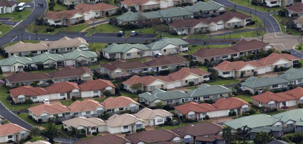 A view of suburban housing south of Auckland.  Photo by The New Zealand Herald.
