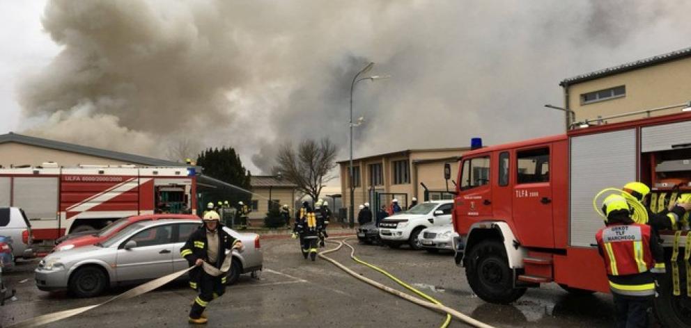 Emergency crews are seen attending to a fire after reports of a gas explosion in Baumgarten. Photo: Reuters Emergency crews are seen attending to a fire after reports of a gas explosion in Baumgarten. Photo: Reuters