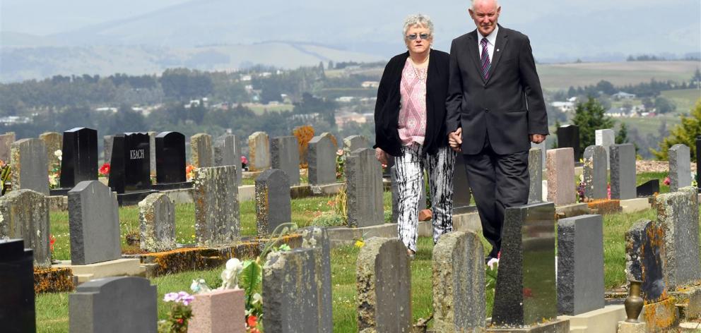 Pam and Kevin Henderson stroll through the Balclutha Lawn Cemetery after retiring from long...