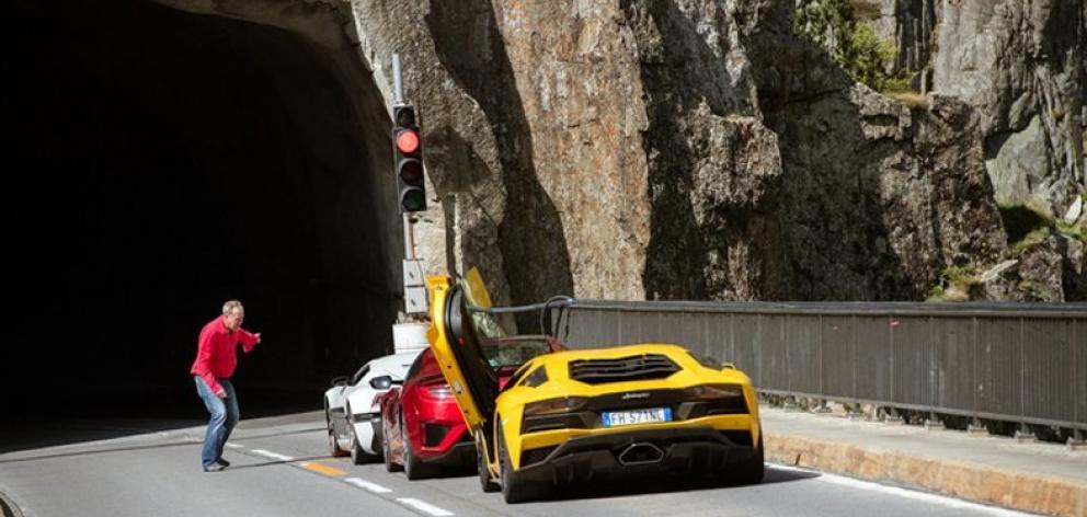 Jeremy Clarkson chats to fellow hosts Richard Hammond and James May before they enter a tunnel in Switzerland in the first of episode of The Grand Tour. PHOTO: AMAZON PRIME VIDEO Jeremy Clarkson chats to fellow hosts Richard Hammond and James May before they enter a tunnel in Switzerland in the first of episode of The Grand Tour. PHOTO: AMAZON PRIME VIDEO