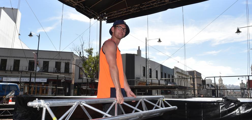 Matthew Pearce helps put together the stage in the Octagon yesterday for Dunedin’s New Year’s Eve...