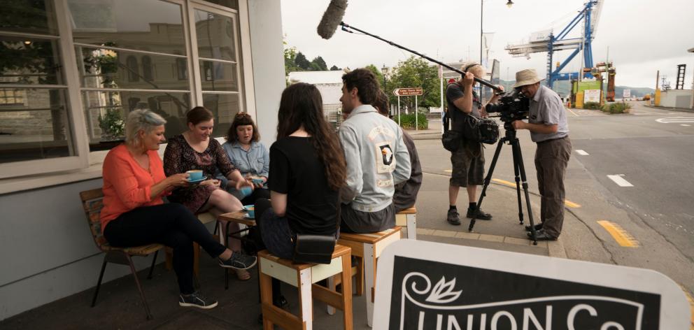 The Heritage Rescue film crew discuss local history with Port Chalmers residents during their visit to Port Chalmers Maritime Museum and the township this week. PHOTO: SUPPLIED