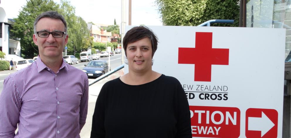 Celebrating the achievement of settling more than 350 former refugees in Dunedin in the past 18 months are Red Cross client services team leader Christelle Burger (right) and refugee support volunteer Simon Henshaw. PHOTO: BRENDA HARWOOD Celebrating the achievement of settling more than 350 former refugees in Dunedin in the past 18 months are Red Cross client services team leader Christelle Burger (right) and refugee support volunteer Simon Henshaw. PHOTO: BRENDA HARWOOD