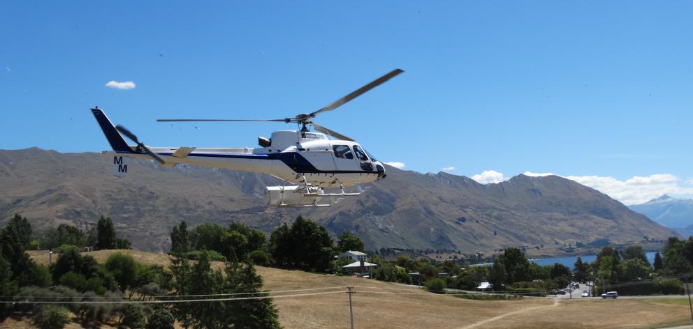 The rescue helicopter takes off for its search after a personal locator beacon was activated in Mt Aspiring National Park. Photo: Kerrie Waterworth 