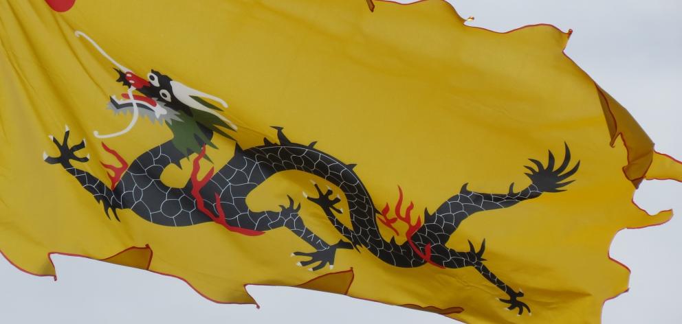 The Flag of the Qing dynasty flutters over the Lawrence Chinese Camp, near Lawrence. Photo:...