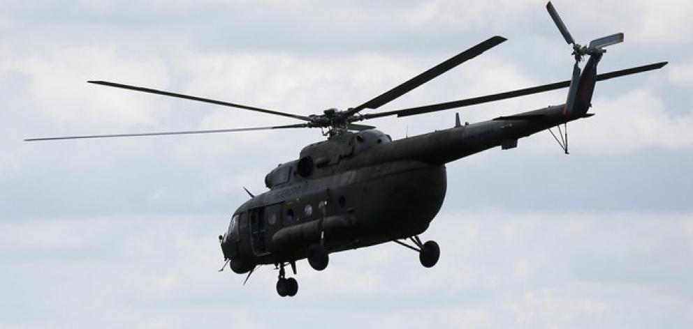 A Russian-made MI-17 helicopter of the Colombian army is seen flying in Meta. Photo: Reuters