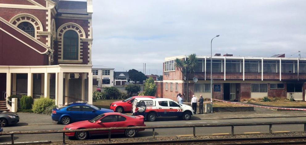 The scene of a suspicious fire in a church-owned flat (far right) next to St Mary's Church in Tyne St, Invercargill, yesterday. Photo: Sharon Reece