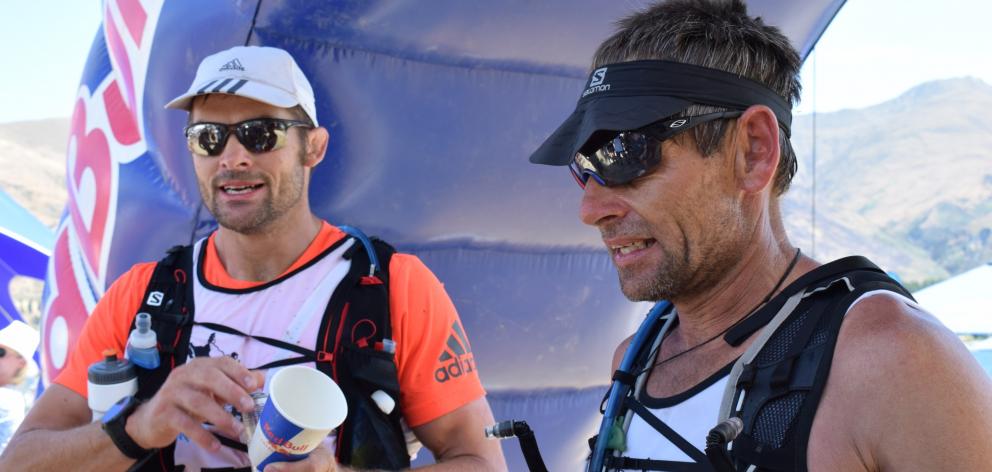 All Black great Richie McCaw (left) and world adventure race champion Bob McLachlan rehydrate ...