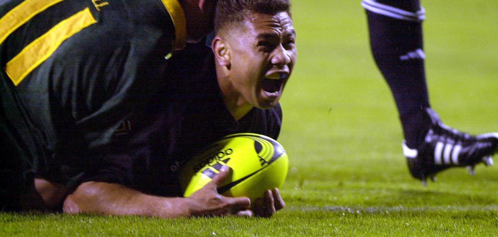 Pita Alatini scores a try for the All Blacks against South Africa during a Tri-Nations test at...