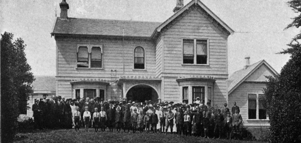 A group of visitors and pupils at the opening of John McGlashan College at Maori Hill, Dunedin. —...