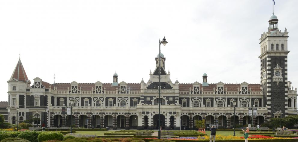 Tourists have an uninterrupted view of Dunedin Railway Station yesterday at the start of a four...