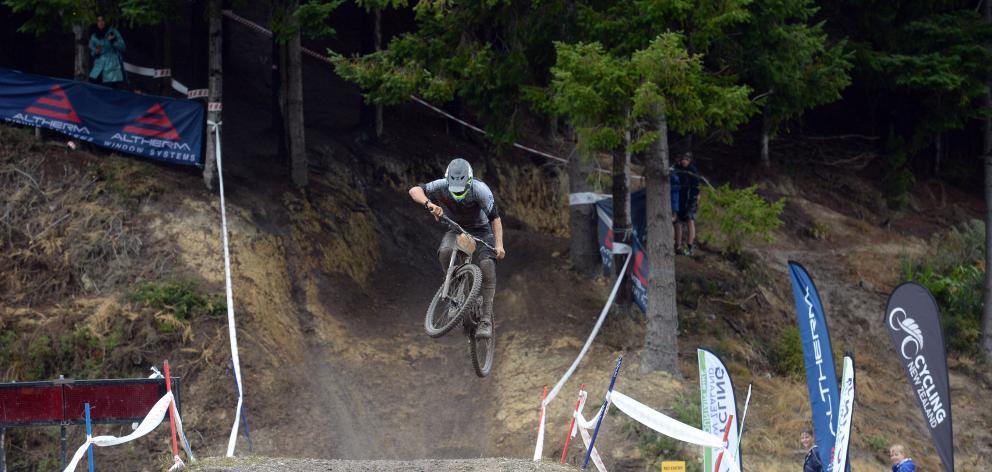 Sam Blenkinsop gets some air over the last jump of the Signal Hill track. Photos: Linda Robertson