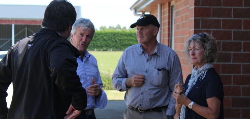 Minister for Agriculture Damien O’Connor (second from left) talks with DairyNZ Southland/South Otago regional manager Richard Kyte (back to camera) and Balfour dairy farmers Lyall and Jan Hopcroft last week about the drought at the Hopcrofts’ farm. PHOTO: