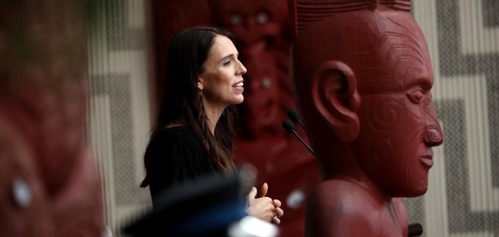 New Zealand Prime Minister Jacinda Ardern speaks on the veranda of Te Whare Runanga on the Waitangi Treaty Grounds. Photo: Getty Images New Zealand Prime Minister Jacinda Ardern speaks on the veranda of Te Whare Runanga on the Waitangi Treaty Grounds. Photo: Getty Images