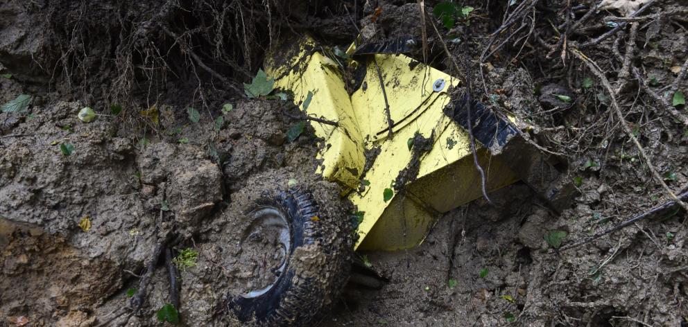 Greg Davis’ wood chipper was washed down the hill from Balaclava and is now deep in the mud in...