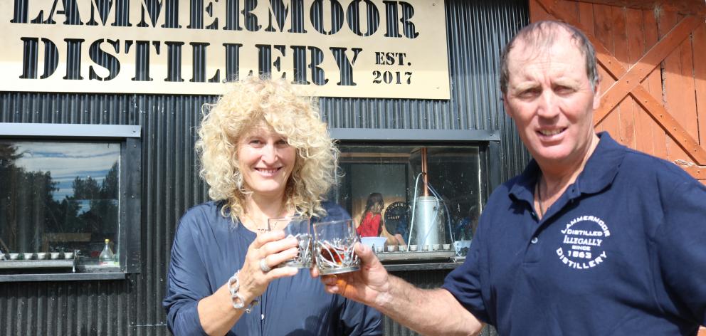 Susan and John Elliot toast to the opening of the Lammermoor Distillery on their farm in the...