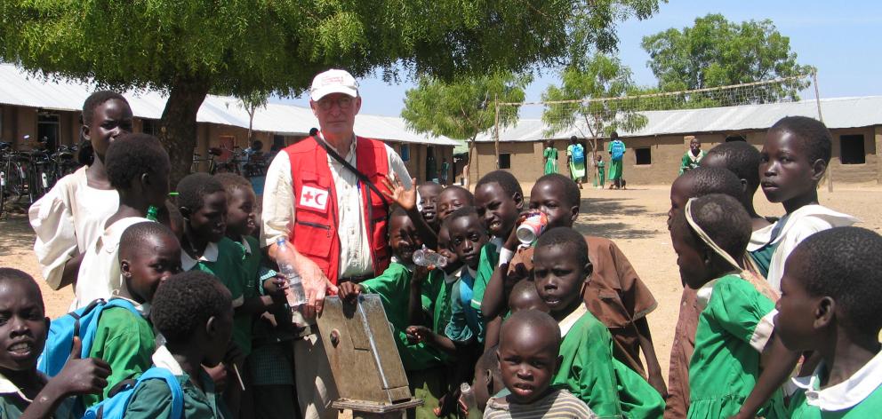 Mr Clark with school children in Juba, South Sudan