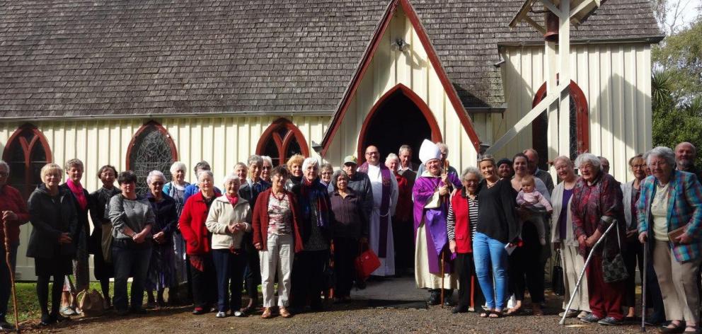 The Anglican Bishop of Dunedin, the Rt Rev Dr Steven Benford (at right of doorway) with St John's...