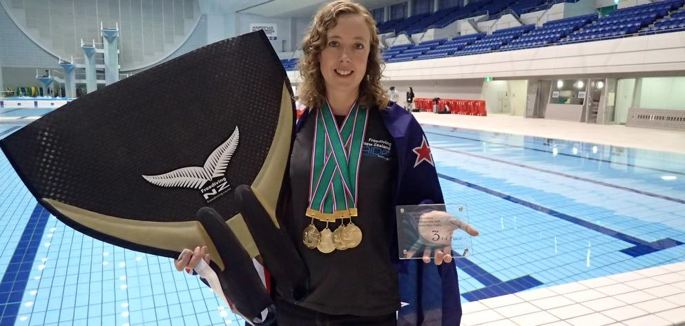 Kathryn Nevatt with her  treble of medals from the Pan Pacific Freediving Championships in Tokyo....