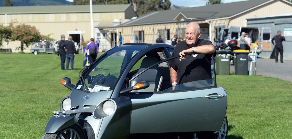 80-year-old Whakatane biker Malcolm Wilson shows off his Carver One three-wheeler at the Ulysses...