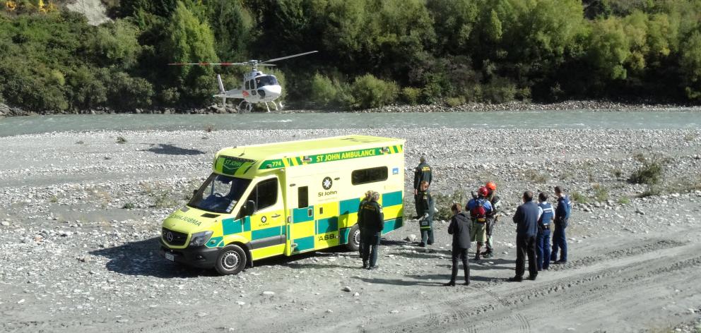 A rescue helicopter lands on the beach by Edith Cavell Bridge, Arthurs Point, about noon today, following what is understood to be a rafting accident on the Shotover River. PHOTO: GUY WILLIAMS