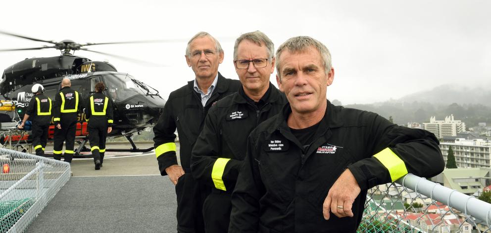Twenty years on from the inaugural landing, crew (from left) Helicopters Otago chief pilot Graeme...