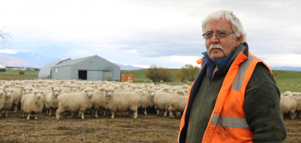 James Armstrong, in front of his woolshed, which was without power for more than six weeks as he...