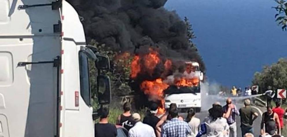 The bus was fully engulfed in flames. Photo: Laura Smith
