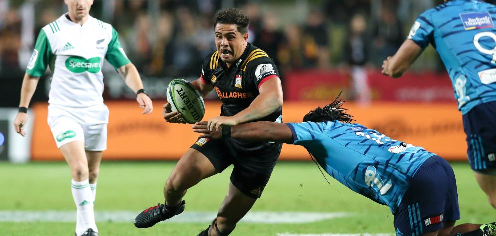 Anton Lienert-Brown breaks out of a tackle during a match between the Chiefs and the Blues in Hamilton (7/4/18). Photo: Getty Images 