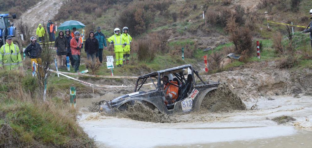 Mike McCarthy competes in the winch challenge section of the Land Rover Owners Club Otago Mud...