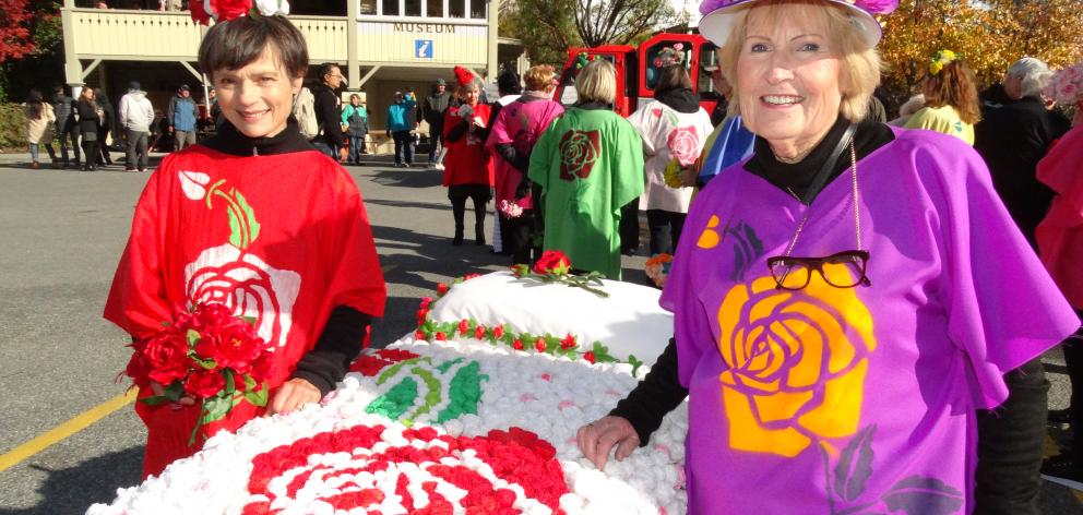 Helen Paterson (left) and Helen Hay display  their bed of roses at the Arrowtown Autumn Festival....