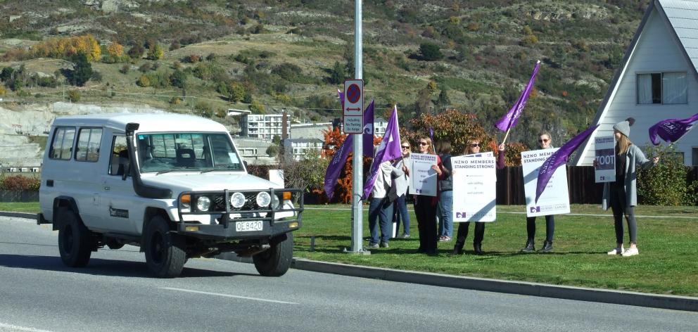 Nurses from Lakes District Hospital protest on Kawarau Rd yesterday. PHOTO: GUY WILLIAMS
