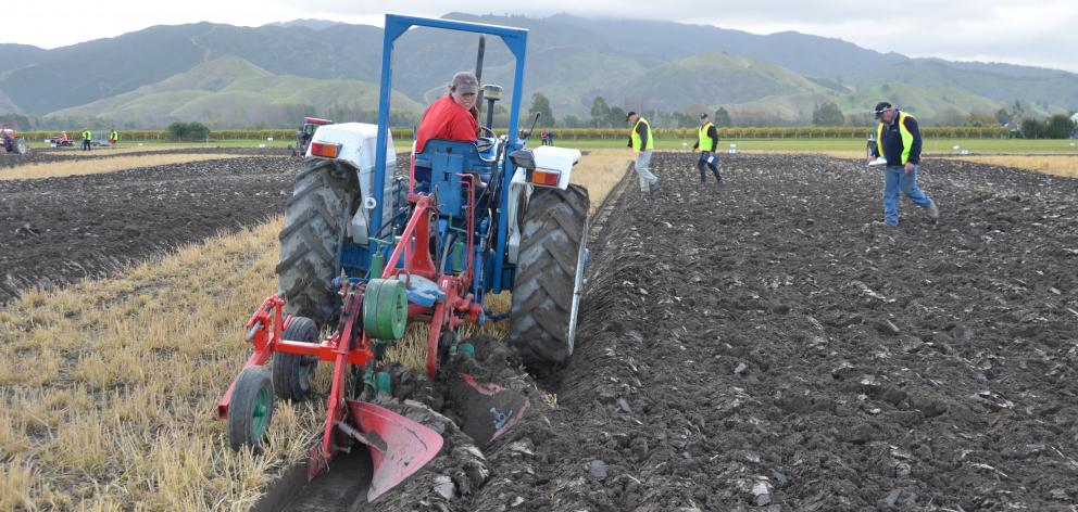 Riversdale woman Tryphena Carter competes in a ploughing match. Photo: Supplied