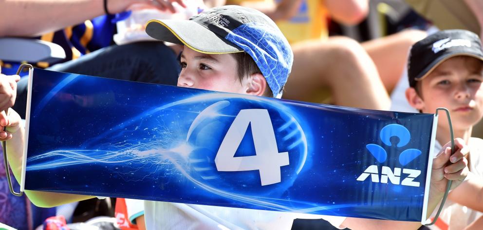 James Higgins (8) celebrates a boundary at the match between New Zealand and England in Dunedin...