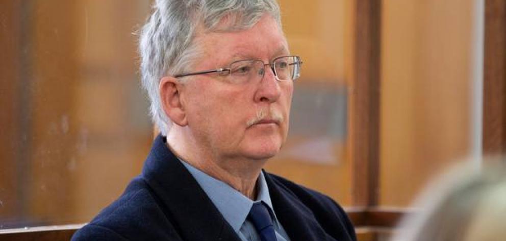 Kapiti Coast councillor David Scott sits in the dock on day one of his trial for indecent assault. Photo: NZ Herald