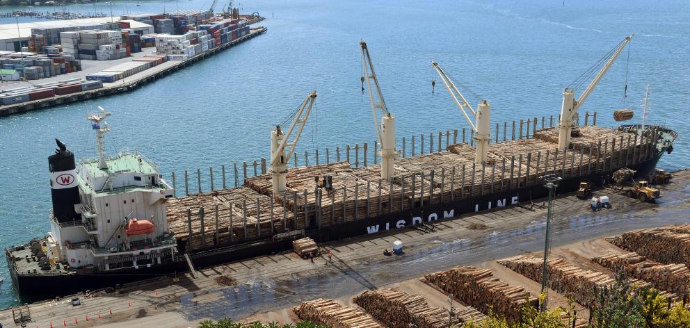 Logs of council-owned City Forest are loaded aboard Bunun Dynasty at the Beach St wharf in Port...