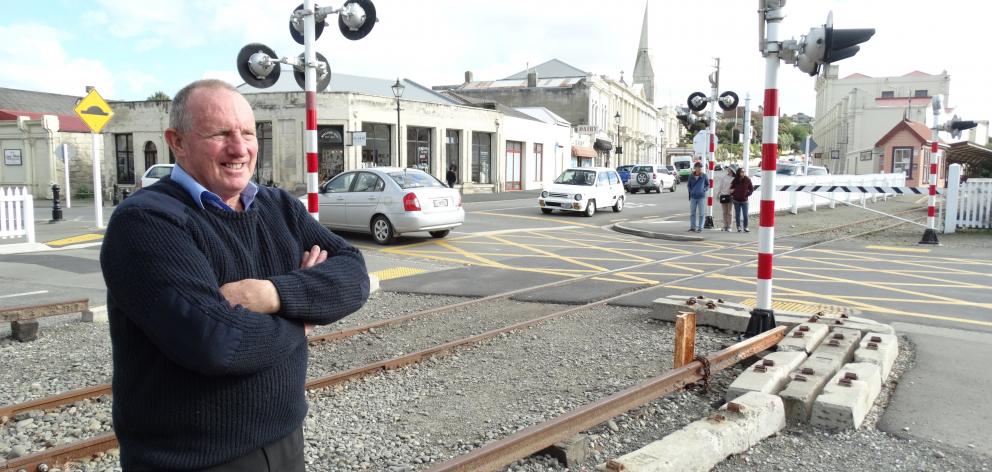 Oamaru Steam and Rail Society general manager Harry Andrew  observes traffic on Humber St...