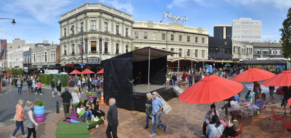 Residents and visitors enjoy the sunshine in the pedestrianised area of the Octagon and lower Stuart St during the recent Ed Sheeran concerts. Photo: Gerard O'Brien