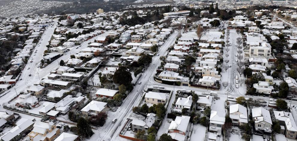 Dunedin's Lynn St - in the centre of this aerial photo taken on a snowy morning in June 2009 - is...