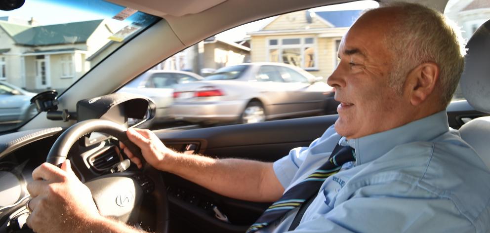 Dunedin streets are busier this year says taxi driver Dean Winton. Photo: Peter McIntosh