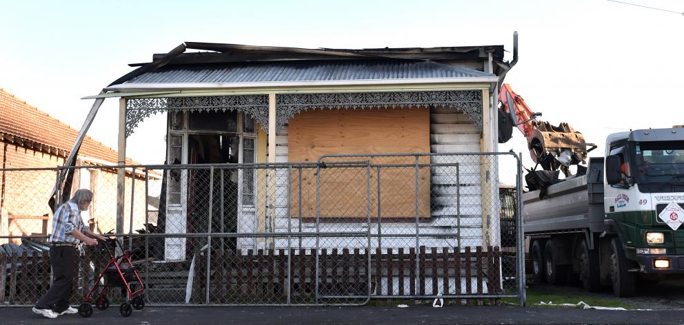 Former tenant Kevin Taggart takes one last look at the house he lived at in Wesley St as it was...