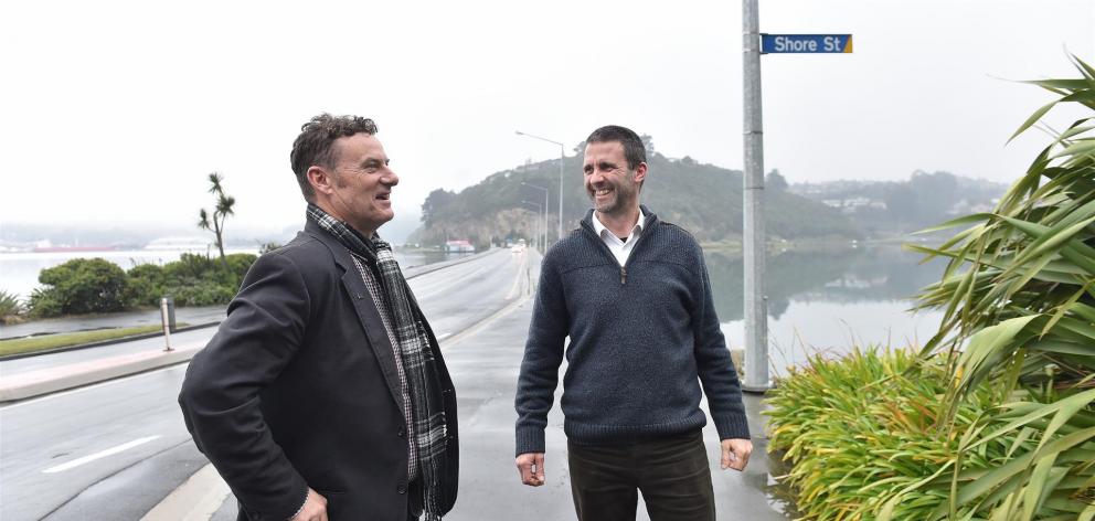 Otago Peninsula Community Board chairman Paul Pope (left) and concerned parent Jason Graham at the start of the new route some peninsula buses will take. Photo: Peter McIntosh