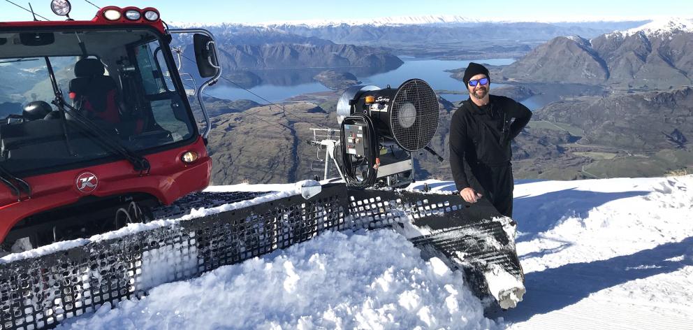 Knee-deep ... Treble Cone Ski Area field operations manager Dave Crotty continues preparations...